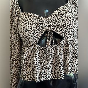 URBAN OUTFITTERS leopard shirt with fun cutout.  Stretch back.  L